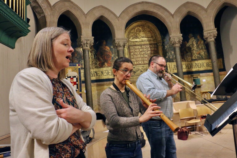 Soprano Clara Rottsolk (left)sings with Heloise Degrugillier (tenor recorder) and Greg Ingles (tenor Sackbut) and other members of Piffaro The Renaissance Band. (Emma Lee/WHYY)