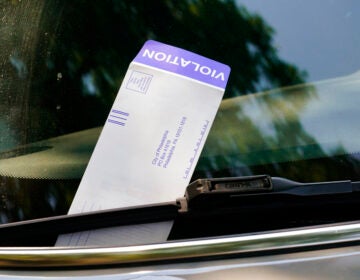 A parking violation in Philadelphia, Tuesday, July 12, 2022. (AP Photo/Matt Rourke)