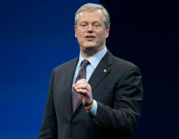 NCAA president Charlie Baker speaks during the NCAA Convention, Thursday, Jan. 12, 2023, in San Antonio. Baker wants to create a new tier of Division I where athlete can be paid by schools. The new subdivision for schools with the most athletic resources could offer unlimited educational benefits, enter into name, image and likeness partnerships with athletes and compensate them through a trust fund.