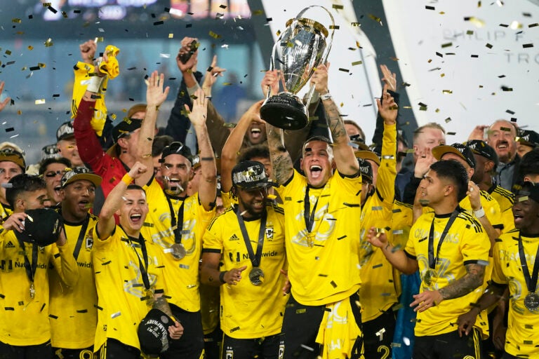 Columbus Crew players celebrate as Christian Ramírez holds up the trophy after defeating Los Angeles FC to win the MLS soccer championship match, Saturday, Dec. 9, 2023, in Columbus, Ohio.