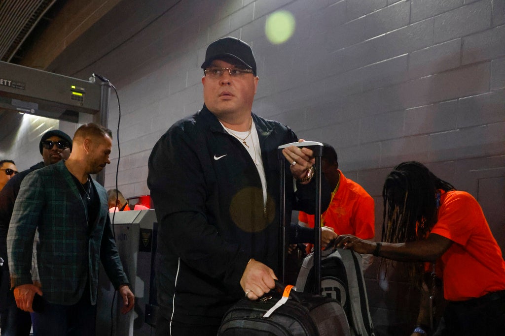 Dom DiSandro stands in a hallway at a stadium