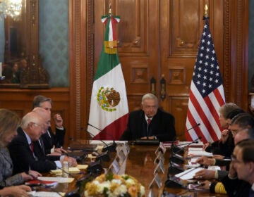Mexican President Andrés Manuel López Obrador (center) meets with U.S. Secretary of State Antony Blinken (top left, partially covered) and his Secretary of Foreign Relations Alicia Barcena (top right) at the National Palace, the office and residence of the president, in Mexico City, Wednesday, Dec. 27, 2023.