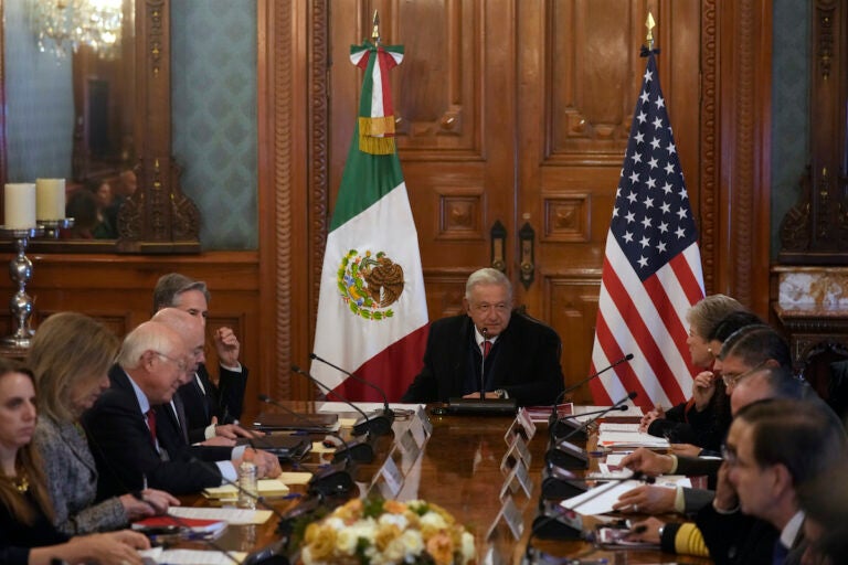 Mexican President Andrés Manuel López Obrador (center) meets with U.S. Secretary of State Antony Blinken (top left, partially covered) and his Secretary of Foreign Relations Alicia Barcena (top right) at the National Palace, the office and residence of the president, in Mexico City, Wednesday, Dec. 27, 2023.