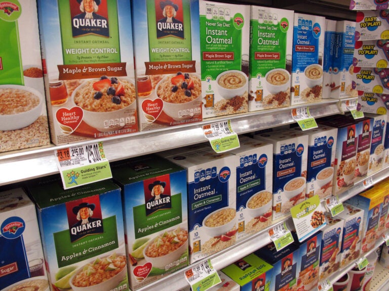 Quaker Oats Company products at Hannaford stores' cereal aisle at a South Portland, Maine, store on Wednesday, Oct. 23, 2013. (AP Photo/Clarke Canfield)