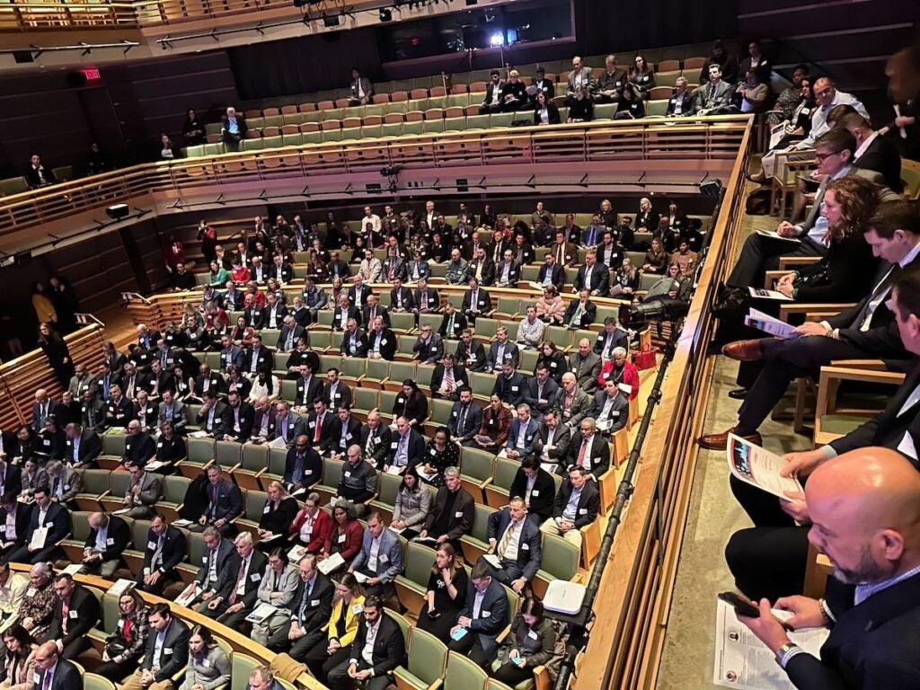 A view from above of attendees at a conference at the Kimmel Center