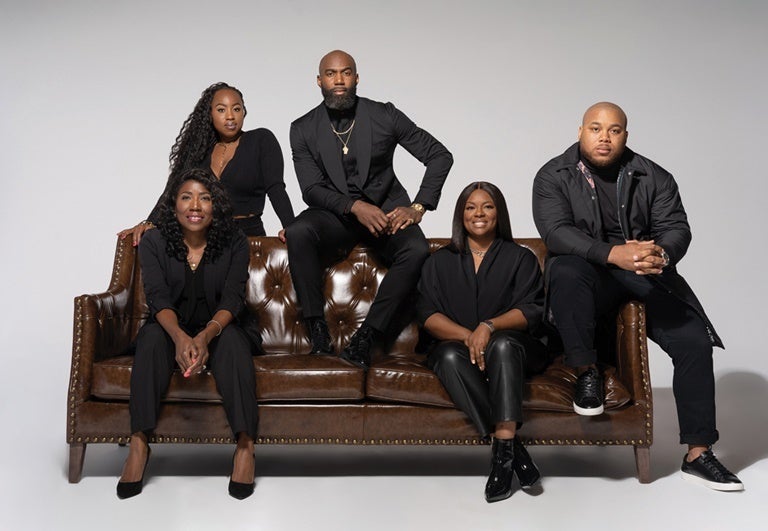 Malcolm Jenkins (middle) is the CEO of Malcolm Inc. with (from bottom left), his mother, Gwendolyn, chief philanthropy officer; Chief Marketing Officer India Robinson; President and Chief Investment Officer Ralonda Johnson; and Chief Operating Officer Joe Johnson.