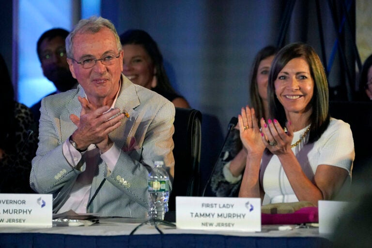 New Jersey Gov. Phil Murphy, left, and first lady Tammy Murphy attend the National Governors Association summer meeting, July 15, 2022, in Portland, Maine. (Robert F. Bukaty/AP)