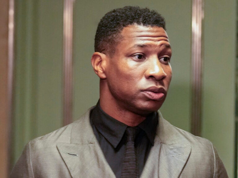 Jonathan Majors enters a courtroom at the Manhattan criminal courts in New York on Dec. 18, 2023. Seth Wenig/AP