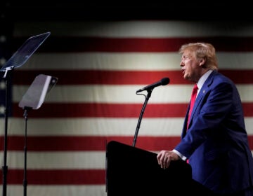 Former President Donald Trump speaks during a rally Sunday, Dec. 17, 2023, in Reno, Nev. In a brief filed Saturday, Trump asked a federal appeals court to dismiss an election interference case against him, arguing he's immune from prosecution. (Godofredo A. Vásquez/AP)