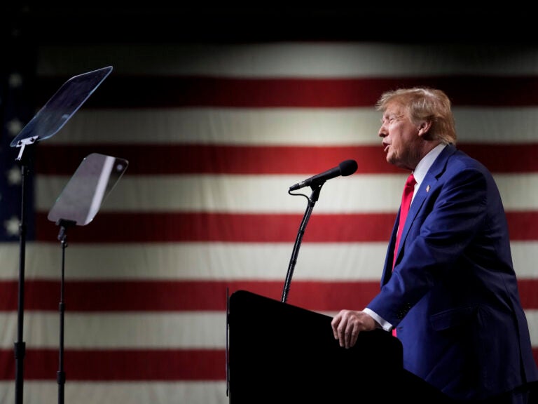 Former President Donald Trump speaks during a rally Sunday, Dec. 17, 2023, in Reno, Nev. In a brief filed Saturday, Trump asked a federal appeals court to dismiss an election interference case against him, arguing he's immune from prosecution. (Godofredo A. Vásquez/AP)