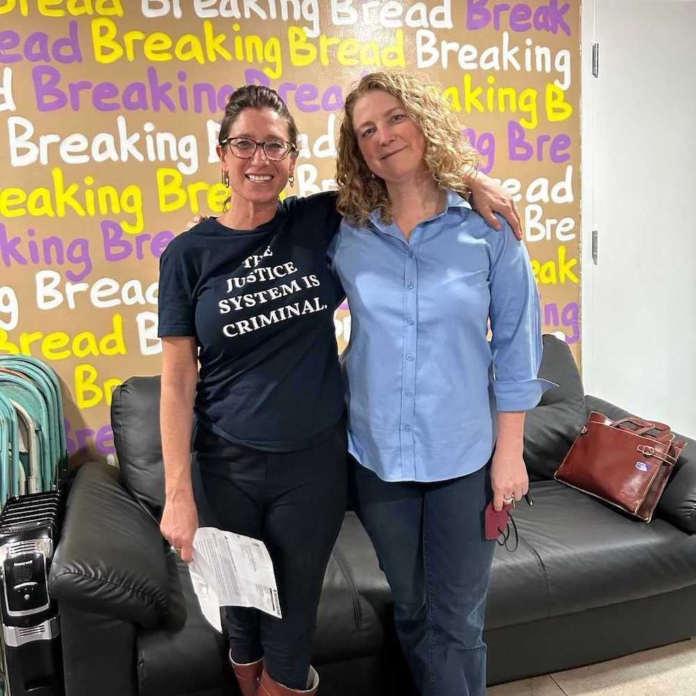 Breaking Bread CEO, Stephanie Sena (left) and board member Lee Aubrey (right) pose for a photo