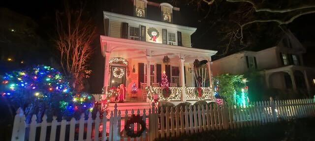 Homes and businesses are lit up for the holiday.