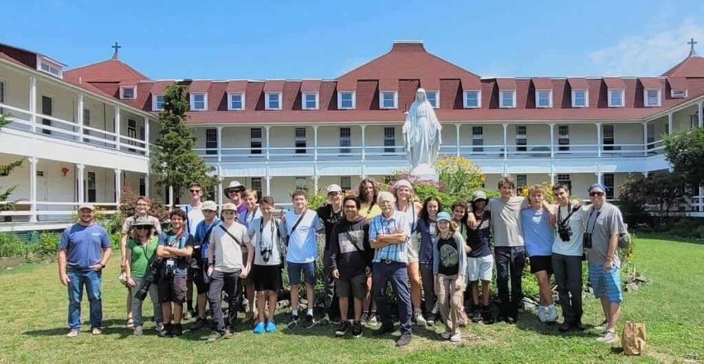 Cape May Point Science Center president Bob Mullock with his team, outside the Science Center building