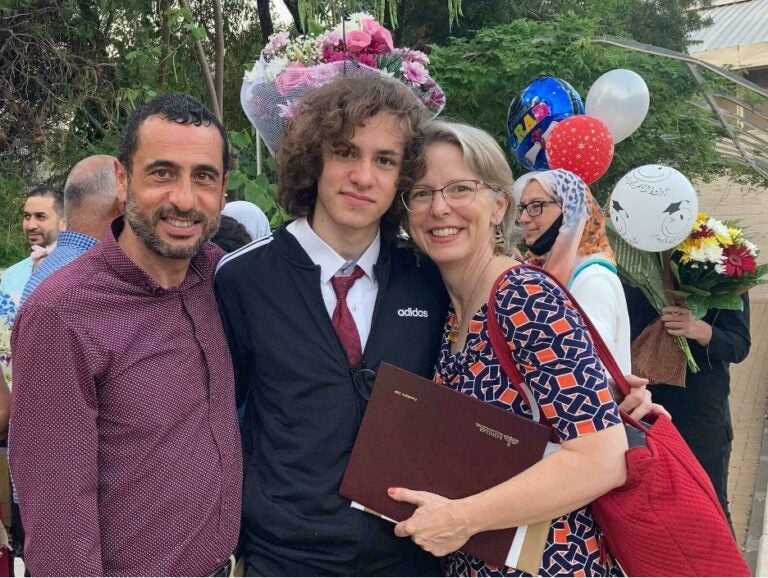 Hisham Awartani with his father, Ali Awartani, and mother, Elizabeth Price. Awartani is a junior at Brown University, studying mathematics and archaeology.n(Elizabeth Price)