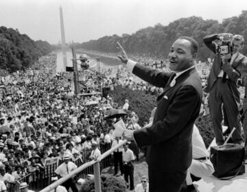 Martin Luther King Jr. waves to supporters on August 28, 1963, during the March on Washington for Jobs and Freedom on the Mall in Washington, D.C. Activists marked 60 years since the march in 2023. (AFP via Getty Images)