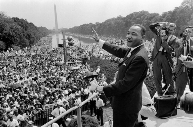 Martin Luther King Jr. waves to supporters on August 28, 1963, during the March on Washington for Jobs and Freedom on the Mall in Washington, D.C. Activists marked 60 years since the march in 2023. (AFP via Getty Images)