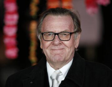 English actor Tom Wilkinson poses for photographers on the red carpet ahead of the Royal and World Premiere of the film The Second Best Exotic Marigold Hotel in London on Feb. 17, 2015. (Justin Tallis/AFP via Getty Images)