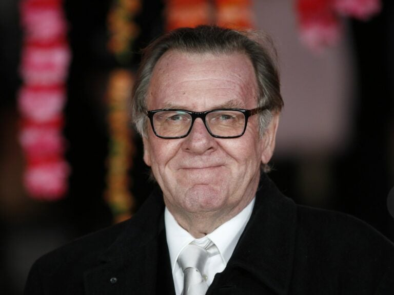 English actor Tom Wilkinson poses for photographers on the red carpet ahead of the Royal and World Premiere of the film The Second Best Exotic Marigold Hotel in London on Feb. 17, 2015. (Justin Tallis/AFP via Getty Images)