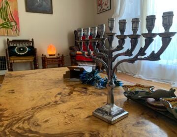 A menorah displayed on a table.