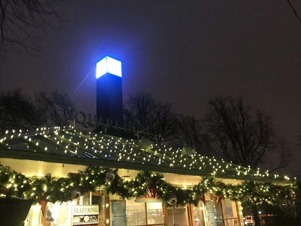 A LED-illuminated square on top of a building in Franklin Square.