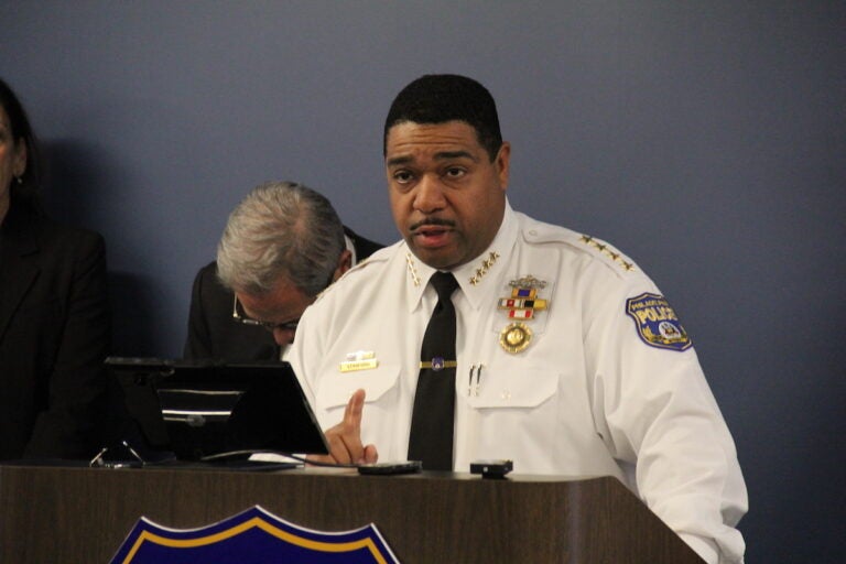 Interim Police Commissioner John Stanford speaks at a podium