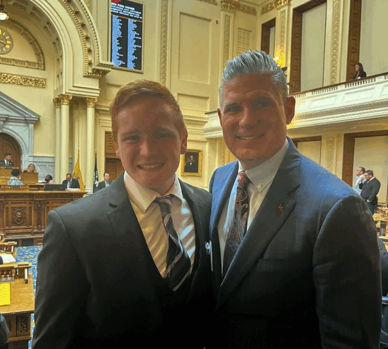 Paul St. Pierre, left, and NJ Assemblyman Lou Greenwald, right, pose for a photo
