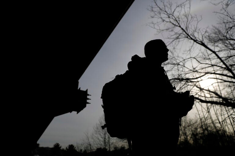 A physician assistant checks a vacant homeless camp in an attempt to provide medical care.