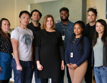 The Pulse team (from left) Senior Editor and Producer Lindsay Lazarski, Reporter Alan Yu, Reporter Grant Hill, Host and Executive Producer Maiken Scott, Health Equity Fellow Marcus Biddle, Producer Nichole Currie, Engineer Charlie Kaier, and Reporter Liz Tung. (Emma Lee/WHYY)