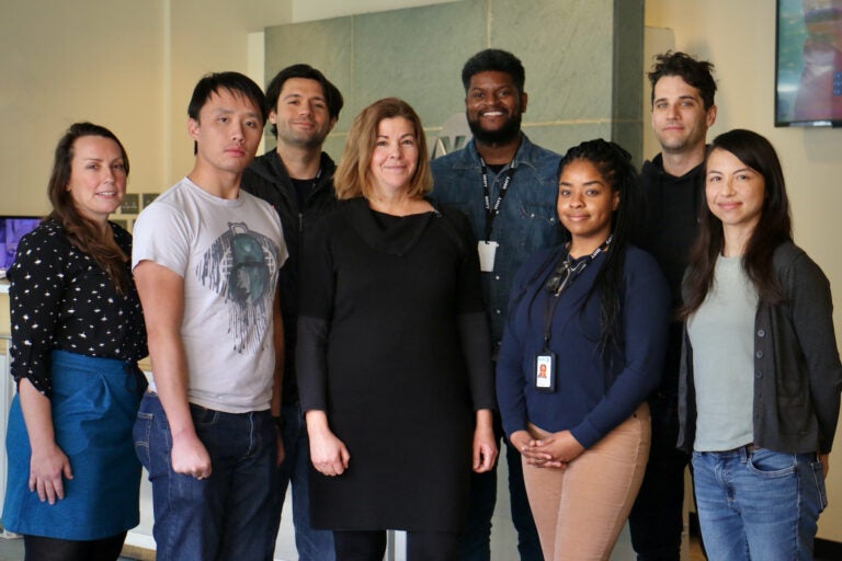 The Pulse team (from left) Senior Editor and Producer Lindsay Lazarski, Reporter Alan Yu, Reporter Grant Hill, Host and Executive Producer Maiken Scott, Health Equity Fellow Marcus Biddle, Producer Nichole Currie, Engineer Charlie Kaier, and Reporter Liz Tung. (Emma Lee/WHYY)