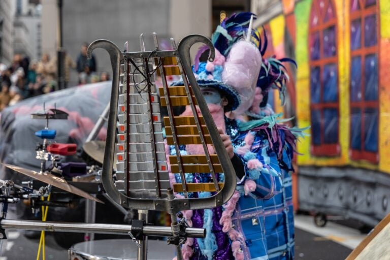 A member of the Uptown String Band plays the glockenspiel at the 2024 Mummers parade