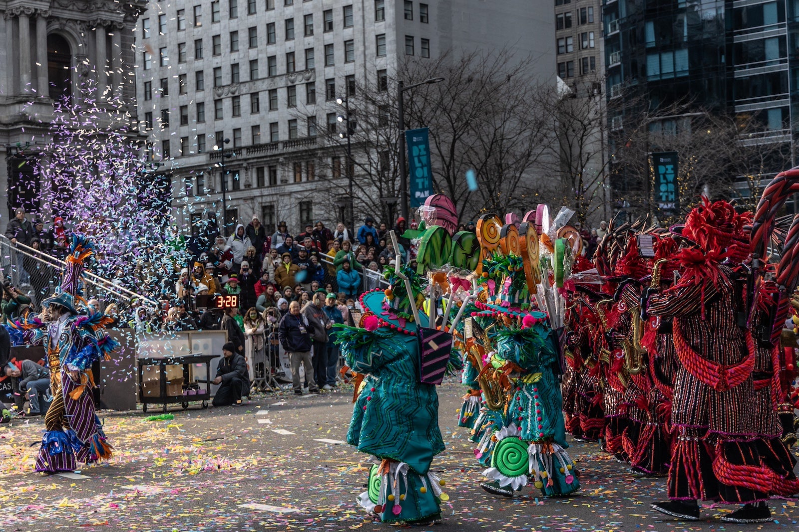 The Uptown String Band performs for spectators at City Hall during the 2024 Mummers parade in Philadelphia.