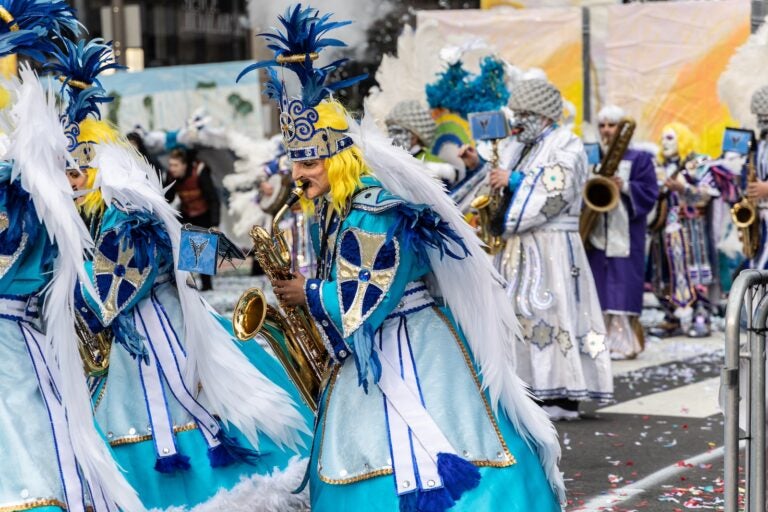 A member of the Ferko String Band plays the saxophone at the 2024 Mummers parade in Philadelphia.