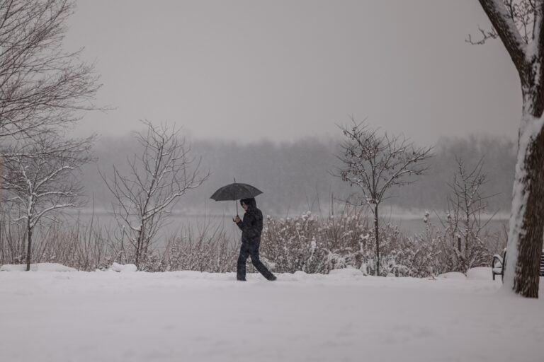 Snow lovers came to walk along the Delaware River Penn Treaty Park in Philadelphia during a snow storm on Jan. 19, 2024.