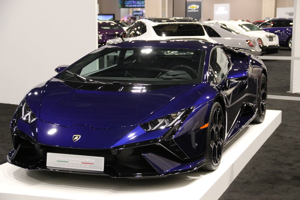 Multiple exotic vehicles are on display at the Philadelphia Auto Show, including Lamborghinis and Rolls-Royces.