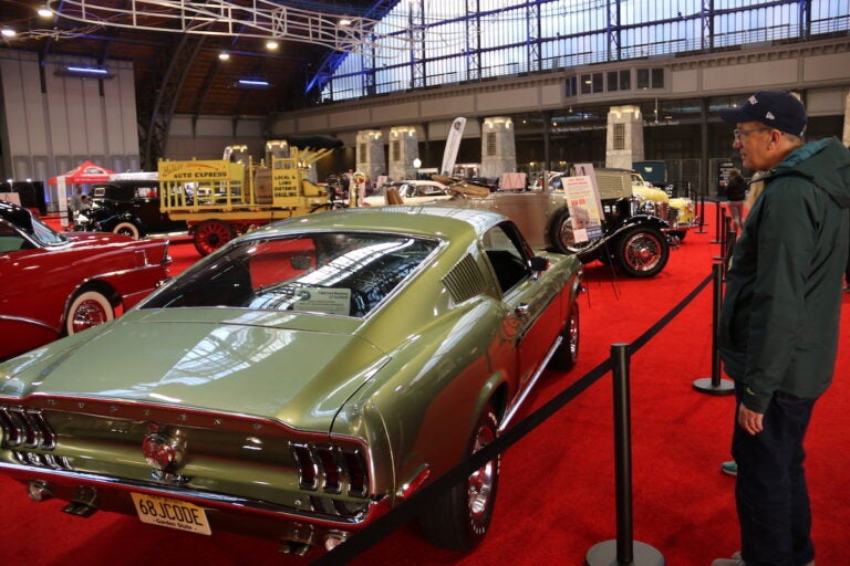 Classic cars adorn the Back-in-the-Day Way display in the Grand Hall of the Pennsylvania Convention Center.