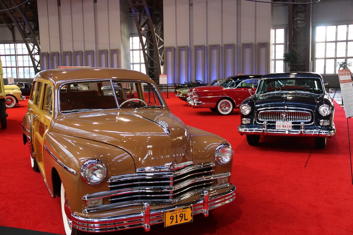 Classic cars adorn the Back-in-the-Day Way display in the Grand Hall of the Pennsylvania Convention Center.