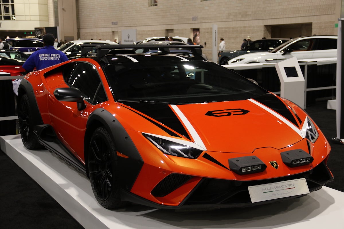 Multiple exotic vehicles are on display at the Philadelphia Auto Show, including Lamborghinis and Rolls-Royces.