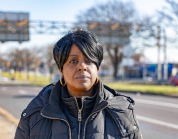 Latanya Byrd stands in front of Roosevelt Boulevard