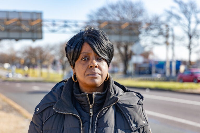 Latanya Byrd stands in front of Roosevelt Boulevard