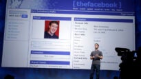 Facebook CEO Mark Zuckerberg talks about an old Facebook web site during the F8 conference in San Francisco.(AP Photo/Paul Sakuma, File)