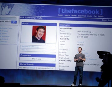 Facebook CEO Mark Zuckerberg talks about an old Facebook web site during the F8 conference in San Francisco.(AP Photo/Paul Sakuma, File)