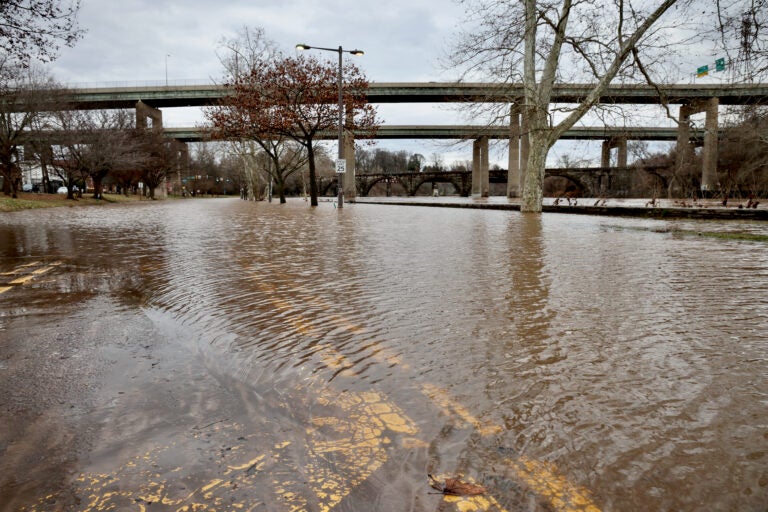 Overflowing river floods Kelly Drive.