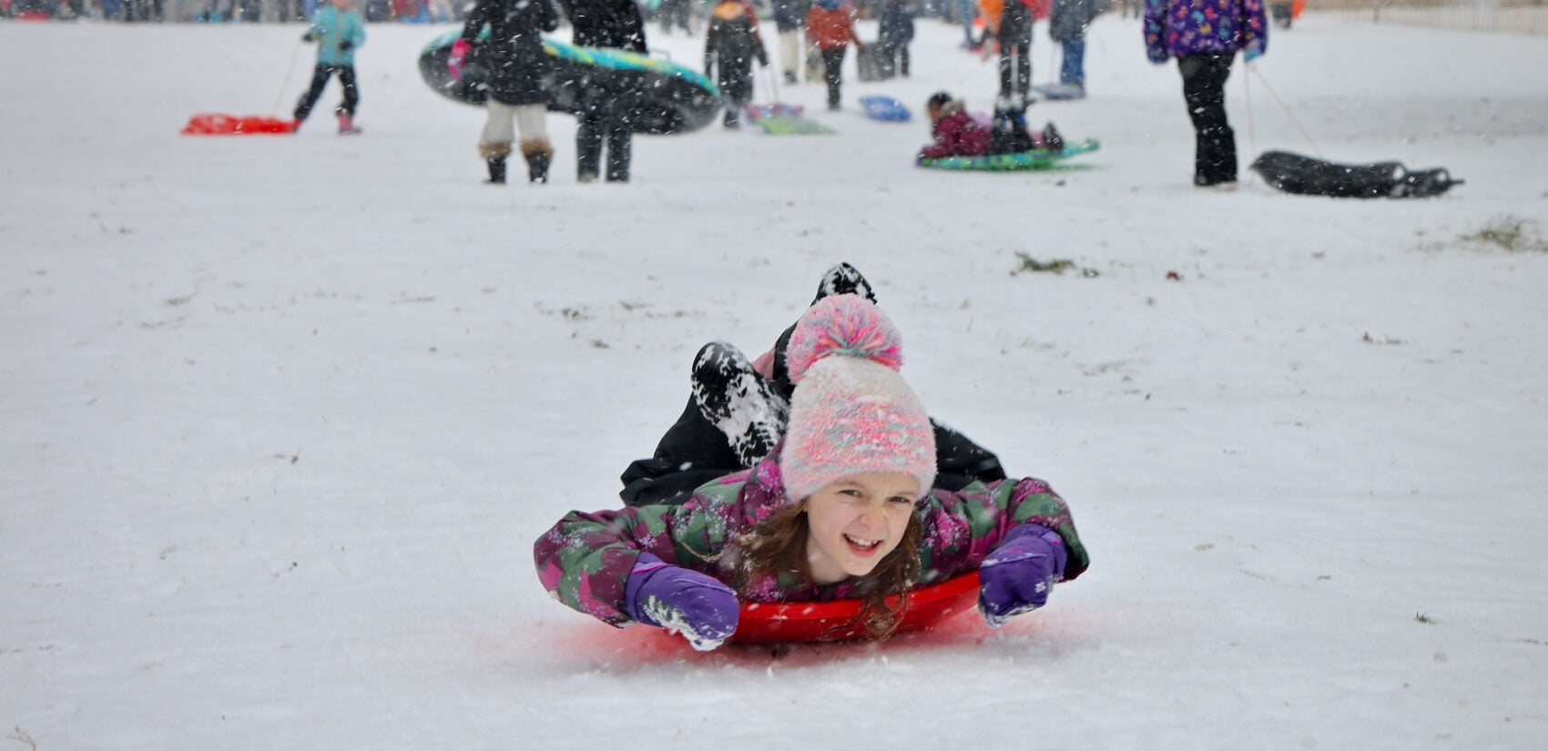 Sledders flock to Stokes Hill in Moorestown.