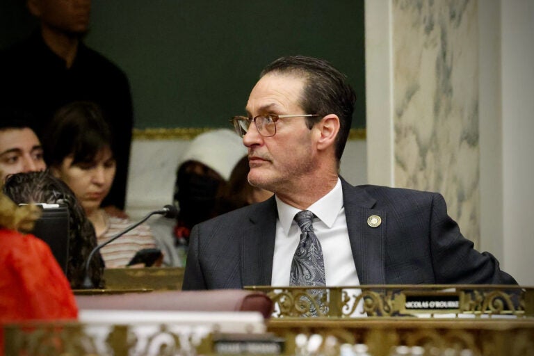 Philadelphia City Councilmember Jim Harrity at his desk in City Council chambers