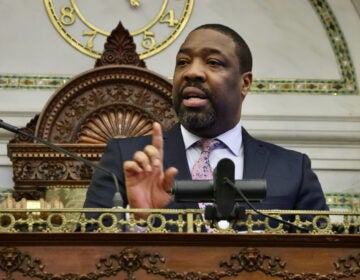 Philadelphia City Council President Kenyatta Johnson gestures as he speaks at the podium at City Council chambers at City Hall