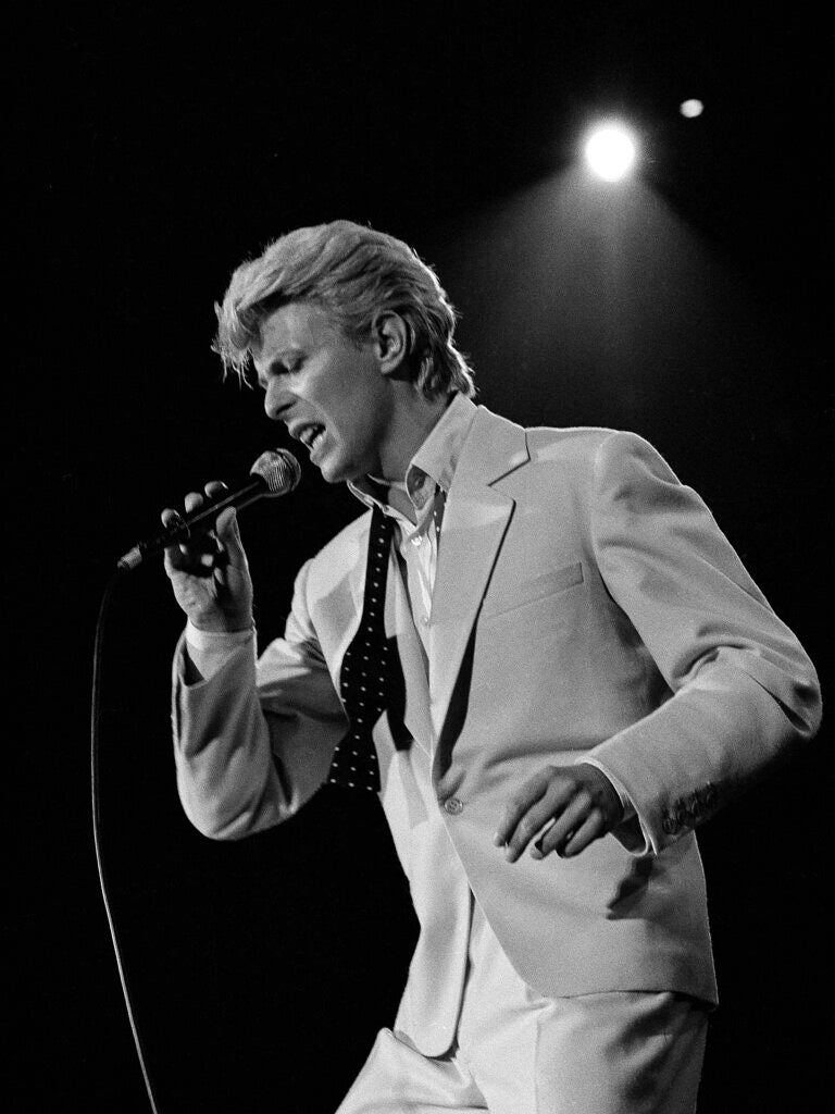 David Bowie performing onstage