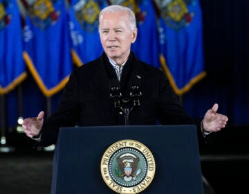 President Joe Biden speaks at a podium