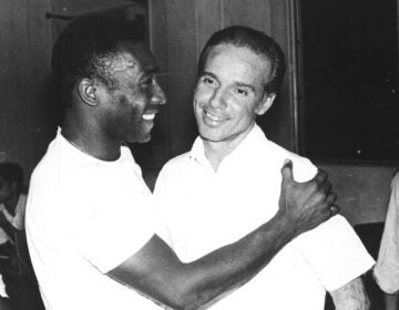 Brazil's soccer star Pele (left) embraces Mario Zagallo after the latter's appointment as coach of the Brazilian national soccer team, in Rio De Janeiro, Brazil, in March 1970. Zagallo, who reached the World Cup final a record five times, winning four, as a player and then a coach with Brazil, has died. He was 92.