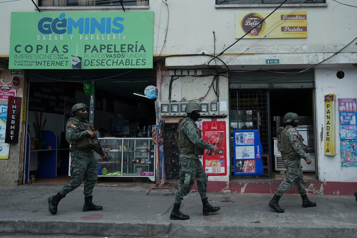 Soldiers patrol the perimeter of Inca prison during a state of emergency in Quito, Ecuador, Tuesday, Jan. 9, 2024, in the wake of the apparent escape of a powerful gang leader from prison. President Daniel Noboa decreed Monday a national state of emergency, a measure that lets authorities suspend people’s rights and mobilize the military in places like the prisons. The government also imposed a curfew from 11 p.m. to 5 a.m. (AP Photo/Dolores Ochoa)