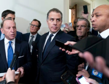 Hunter Biden, President Joe Biden's son, accompanied by his attorney Abbe Lowell, talks to reporters as they leave a House Oversight Committee hearing as Republicans are taking the first step toward holding him in contempt of Congress, Wednesday, Jan. 10, 2024, on Capitol Hill in Washington.  (AP Photo/Jose Luis Magana)